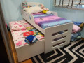 Kids bed frame with trundle in good condition