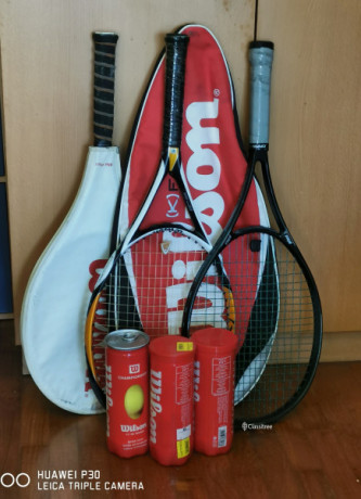 used-tennis-racquets-and-tubes-of-new-tennis-balls-for-sale-big-0